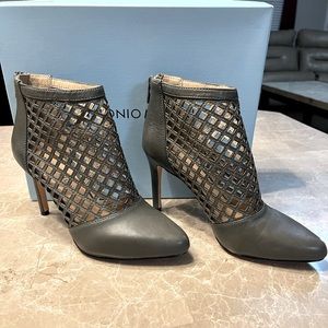 Antonio Melani gray leather caged boots. Size 7.5.
